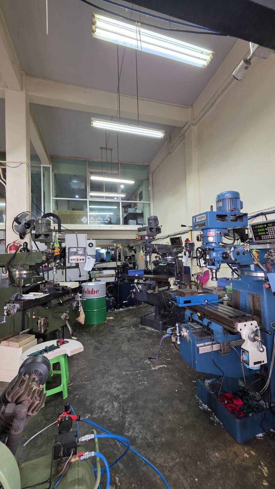 Row of milling machines in our workshop