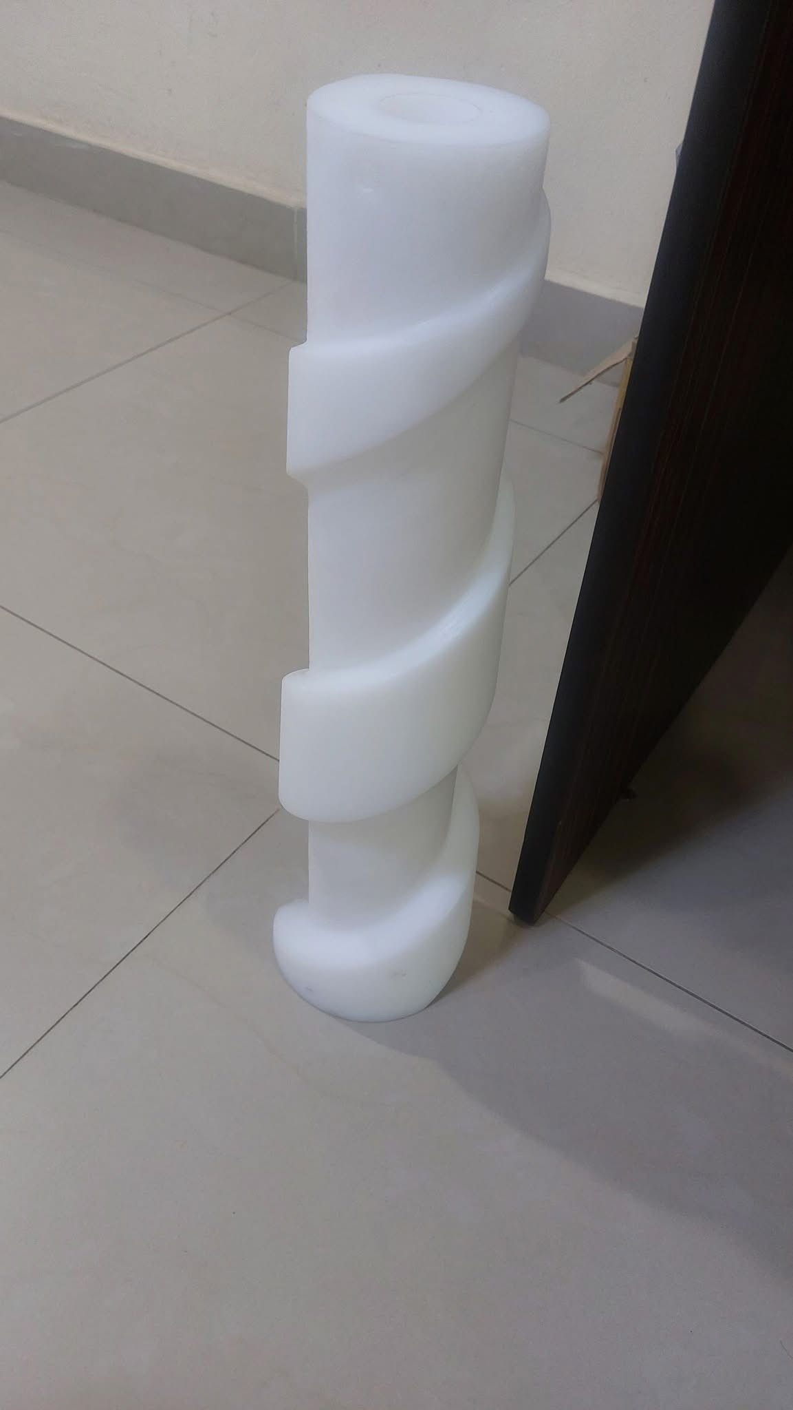 White plastic screw conveyor