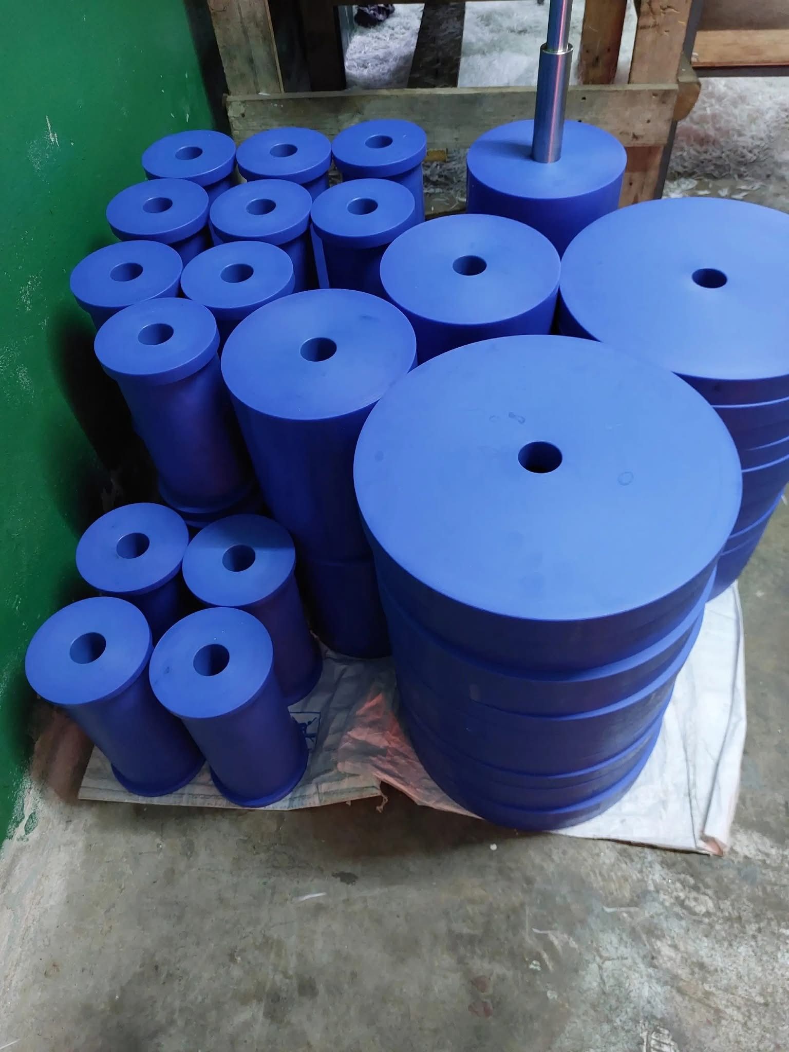 Blue plastic rollers in volume