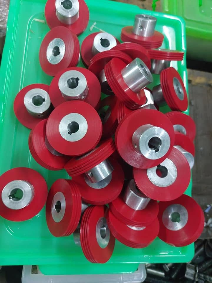 Red polyurethane rollers with metal cores