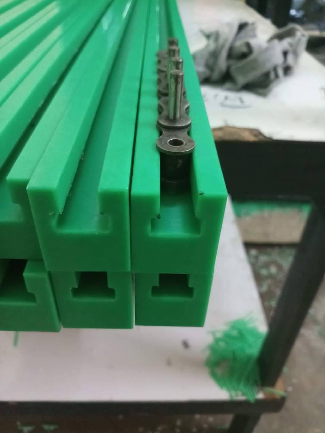Green PE guide rails for conveyors